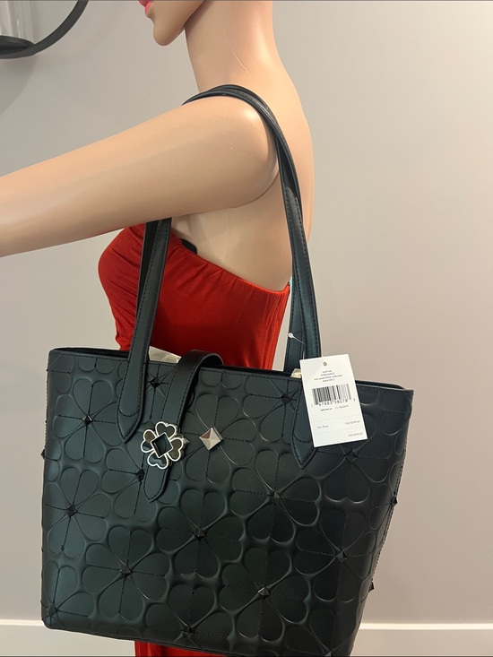 kate spade Handbags - Vintage Kate Spade Black Floral-Embossed Tote with Clover Charm